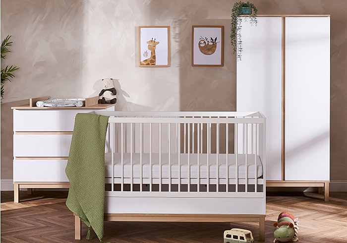 Contemporary 3 piece room set comprising, mini cot bed, 3 drawer changing unit and double wardrobe. White and natural finish.