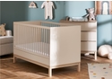 Contemporary cot bed in a satin and natural finish. Three mattress base heights. Transforms to a toddler bed.