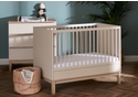 Modern mini 2 piece nursery room set includes mini cot bed and 3 drawer changing unit. Satin and natural finish.