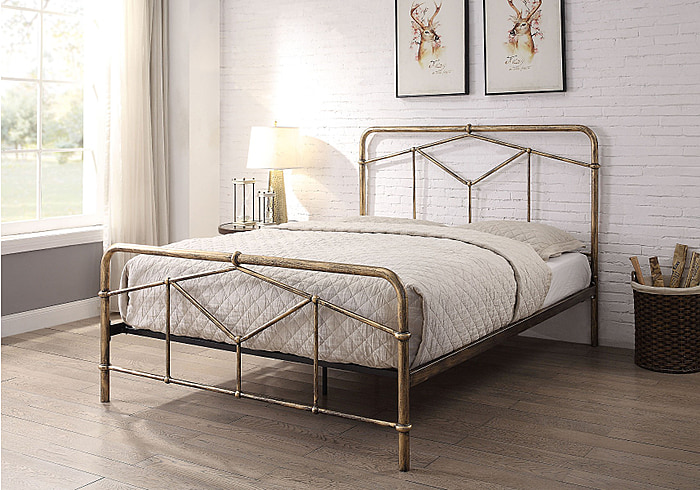 Metal bed frame with an art deco style. Geometric designed headboard and foot board. Distressed antique bronze finish.