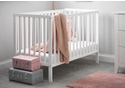 White wooden cot with open an open slat design. Includes teething rails and 3 height position base.