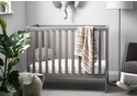 Taupe grey painted wooden cot with open slat design. Teething rails, 3 height positions