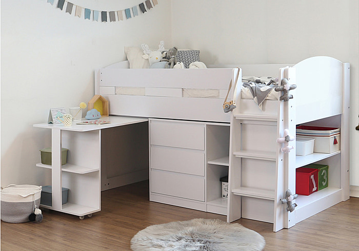 White, modern mid sleeper bed with 3 drawers, pull out desk and three sets of shelves. Compact design.