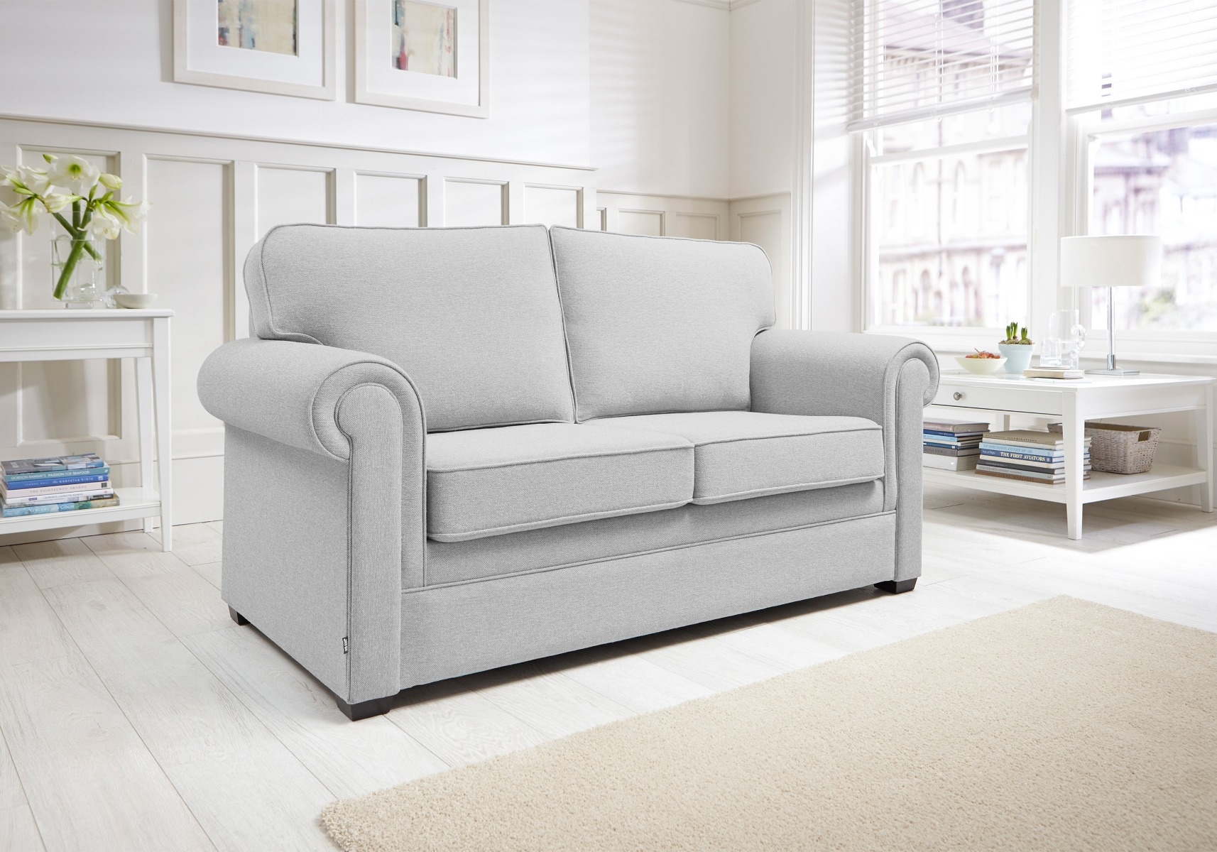 Grey sofa bed in sofa form