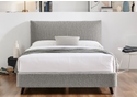 Contemporary grey boucle fabric bed frame with a pillow back headboard. Low foot end and stylish angled dark feet.