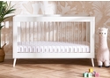 Modern Scandinavian design cot bed in a white and acrylic finish with a 3 base height positions.
