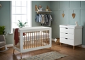 Scandinavian style white and natural 2 piece mini room set including a mini cot bed and 3 drawer changing unit.