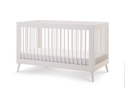 Modern Scandinavian design cot bed in a nordic white finish with a 3 base height positions.