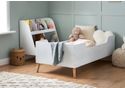 Scandi style toddler bed in a modern white and natural finish. Built in safety guard rails. White frame with natural angled legs.