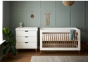 Scandinavian style two piece room set in white and natural. Cot bed and 3 drawer changing unit.