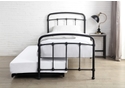 Black metal Victorian style guest bed with pull-out under bed. Curved headboard and footboard.