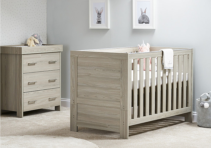 Contemporary 2 piece nursery set, cot bed and 3 drawer changing unit. Adjustable height cot base and teething rails.