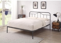Black and silver metal bed frame with a curved headboard and low foot end. Elegant, minimal design