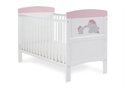 White cot bed with a cute elephant design with pink end panel tops. Open slatted sides, 3 base height positions, teething rails