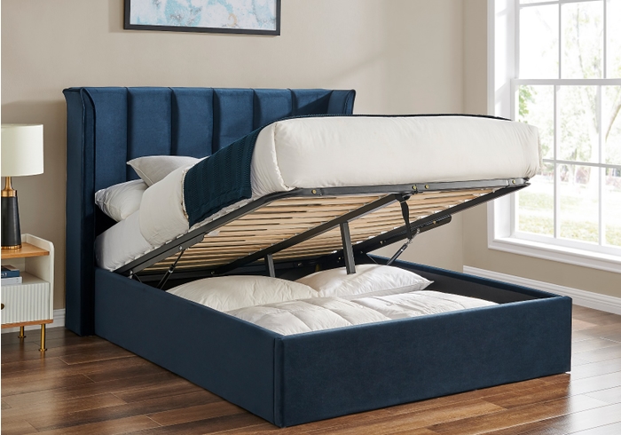 Luxury navy blue recylced velvet fabric ottoman bed frame. Tall winged padded headboard and low footend.