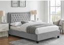 Elegant grey velvet fabric bed frame with button and stud detailing to headboard. Low foot end and stylish dark feet.