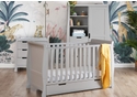 Grey elegant sleigh style nursery set comprising cot bed with drawer, double wardrobe and changing unit with storage.