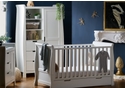 White elegant sleigh style nursery set comprising cot bed with drawer, double wardrobe and changing unit with storage.