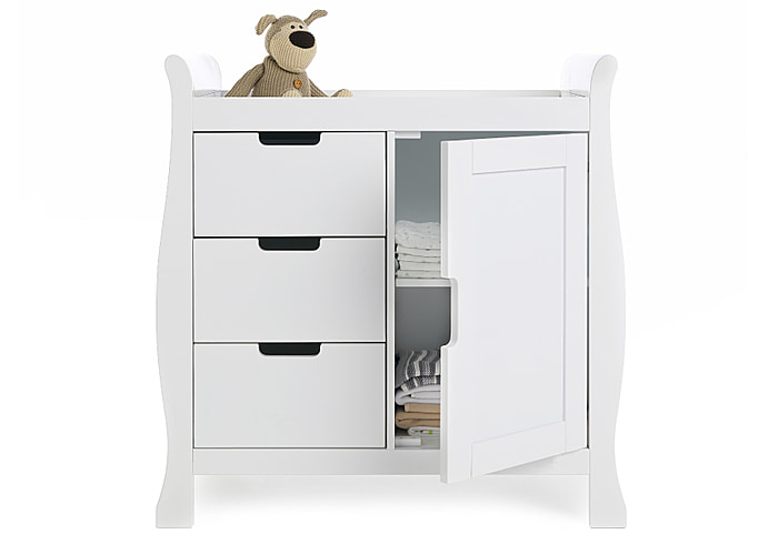 Elegant sleigh style changing unit in a white finish. three drawers and a full height cupboard with adjustable shelf.