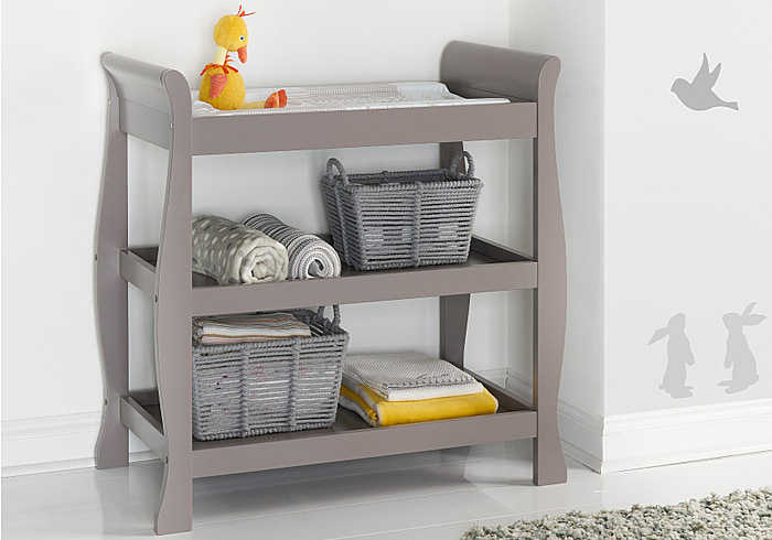 Elegant, taupe, sleigh style open changing unit, 2 large shelves and a recessed changer top.