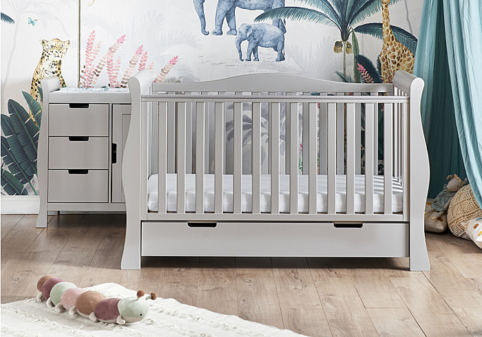 Luxury grey 2 piece sleigh design nursery set. Includes cot bed with drawer and changing unit with storage.