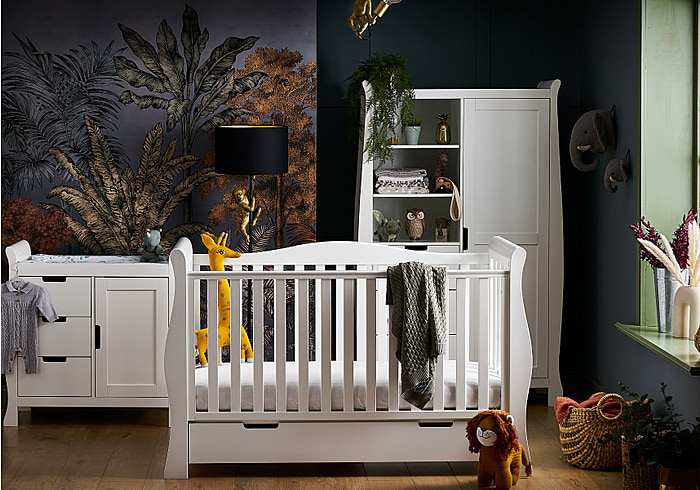 Luxury white 3 piece sleigh design nursery set. Includes cot bed with drawer, double wardrobe and changing unit with storage.