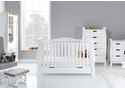 Luxury white sleigh style 5 piece room set. Cot bed with drawer, double wardrobe, tall drawer chest, changing unit and glider chair with stool.