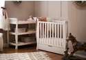 Elegant sleigh design white 2 piece nursery room set. Cot bed with drawer and open changing unit.