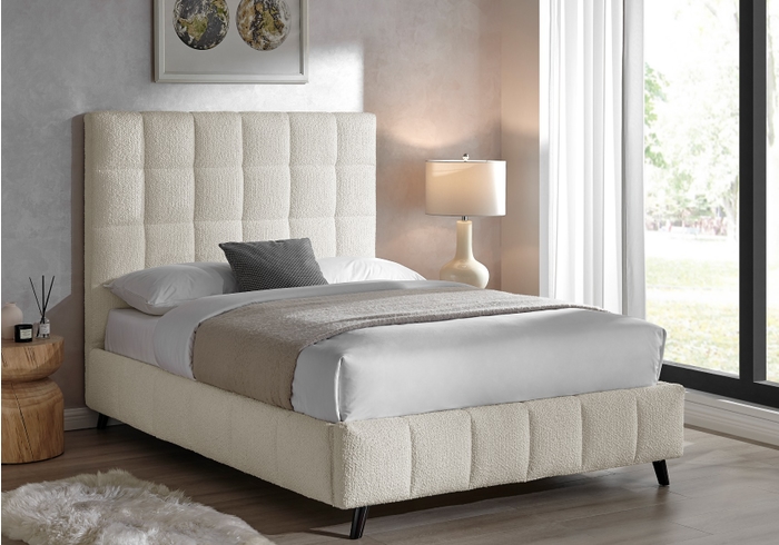 Contemporary Ivory boucle fabric bed frame. The bed features a tall square stitched headboard and matching base with modern splayed legs.