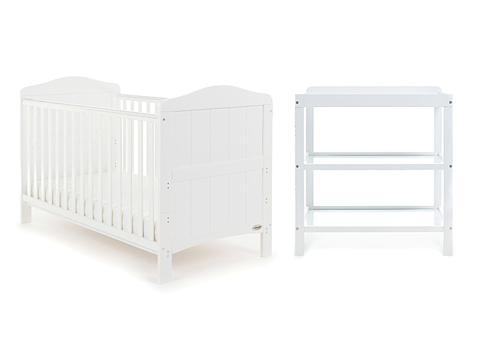Beautiful coastal themed white wooden cot bed with grooved end panels and curves. Open changing unit.