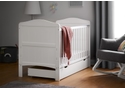 Beautiful coastal themed white wooden cot bed with under drawer. Grooved end panels with gentle curves. Includes teething rails.