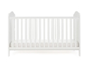 Beautiful coastal themed white wooden cot bed. Grooved end panels with gentle curves. Includes teething rails.