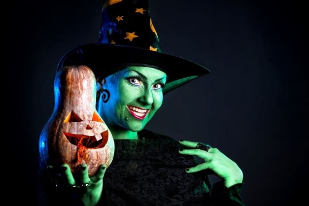 Wicked witch with pumpkin